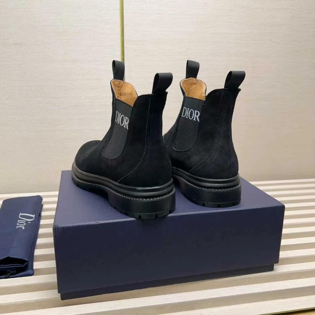 Men's Shoes 💰480 Dior A practical choice that combines protection with classic style. Made from durable Rugged Calf leather, it's tumbled and hand-finished to create a soft suede feel with a rich texture. Elastic side panels and subtle cutouts are inspired by the classic Chelsea boot. Leather upper and lining with Kummel tabs at front and rear, rubber outsole